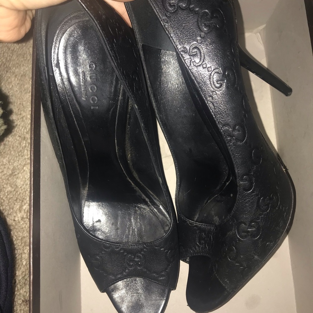 Gucci heels used but black original print